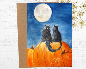 Black Cats Greeting Card, Watercolor Painting of Cats Sitting on a Pumpkin Gazing at the Moon