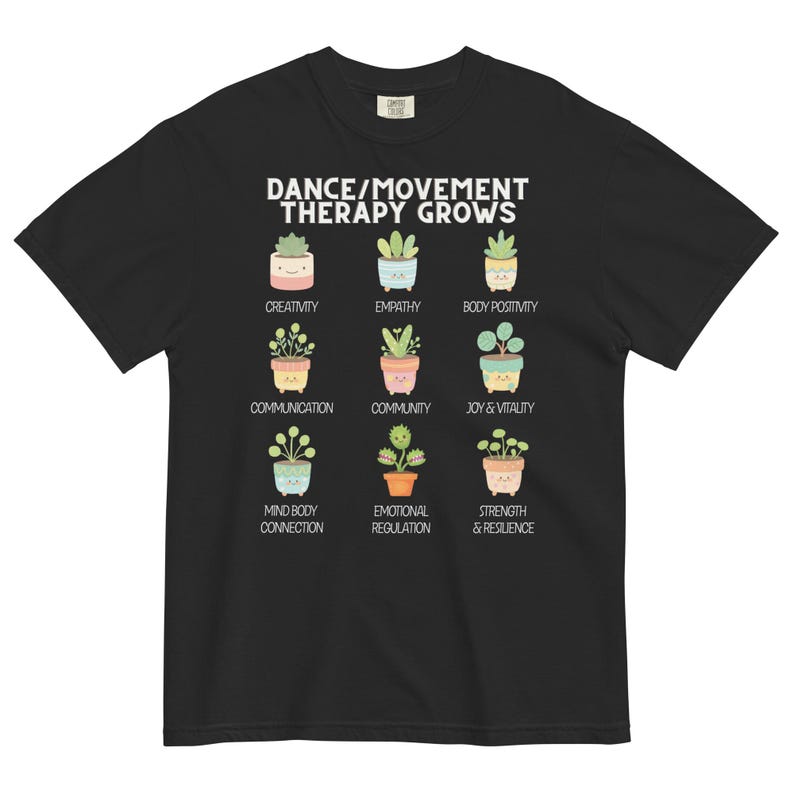 May include: Black t-shirt with the text "DANCE/MOVEMENT THERAPY GROWS" and illustrations of potted plants. Each plant represents a concept like creativity, empathy, and joy & vitality. A comfortable, casual tee.