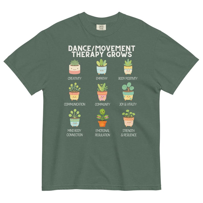 May include: A green t-shirt with the text "DANCE/MOVEMENT THERAPY GROWS" and illustrations of potted plants. Each plant represents a concept like creativity, empathy, and joy & vitality. The shirt is made of a soft material.