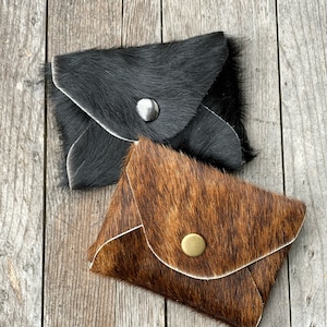 Mini billetera de cuero para tarjetas de crédito, tarjetero de regalo, monedero pequeño con broche de pelo sobre piel de vaca