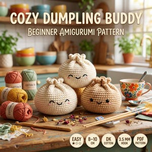 May include: A crochet pattern titled Cozy Dumpling Buddy Beginner Amigurumi Pattern featuring three beige crocheted dumpling figures with embroidered smiling faces, yarn skeins, a wooden crochet hook, and text indicating 8-10 cm size.