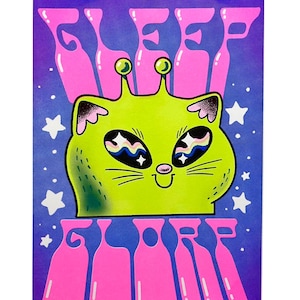 May include: A vibrant poster featuring a lime green cat-like alien with large, patterned eyes and antennae. The words "SLEEP SORRY" are in pink, stylized lettering above and below the alien, set against a purple and blue starry background.