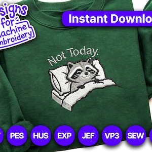 May include: A dark green sweatshirt with an embroidered design of a raccoon resting on a pillow, with the words "Not Today." above it. The text "Instant Download!" is at the top. The design is for machine embroidery.