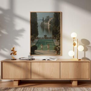Vintage tennis court illustration with a retro aesthetic, featuring classic green and white tones, Ralph Lauren style preppy wall art for a sophisticated living room or home office decor.
