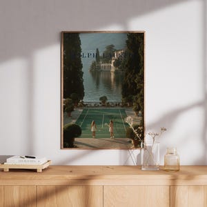 Vintage tennis court illustration with a retro aesthetic, featuring classic green and white tones, Ralph Lauren style preppy wall art for a sophisticated living room or home office decor.