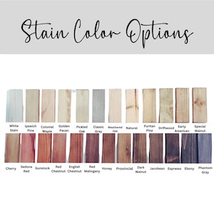 May include: A display of wood stain color options. The image shows rectangular wood samples in various colors, including white, gray, red, and brown. The text "Stain Color Options" is at the top.
