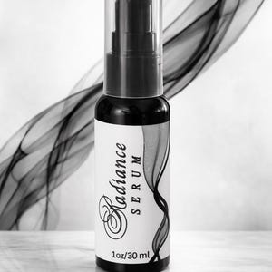 Radiance face serum in 1 oz black pump bottle with clear cap, lightweight glow serum for mature skin