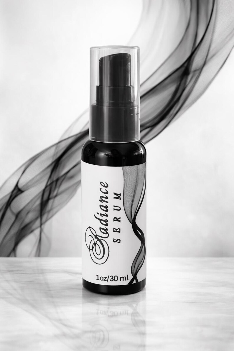 Radiance face serum in 1 oz black pump bottle with clear cap, lightweight glow serum for mature skin