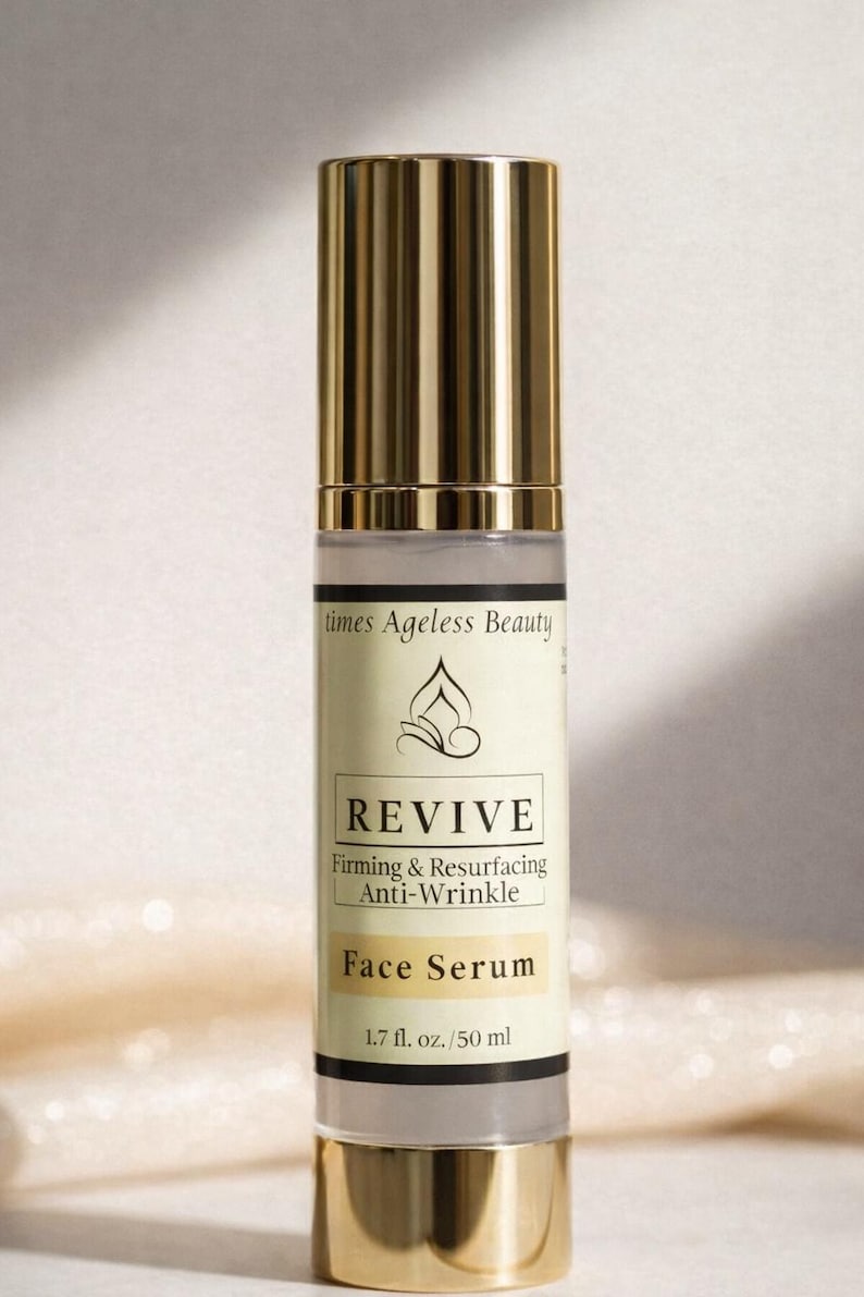 Revive firming and resurfacing anti wrinkle face serum in gold airless pump bottle for mature skin with lightweight hydration and glow focused skincare benefits