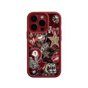 May include: A red phone case featuring a collage design. The design incorporates leopard print, stars, hearts, and a pool ball with the number 7. The case has a red border and camera aperture.