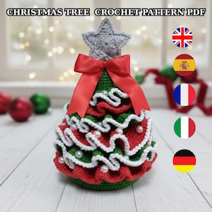 May include: A handmade crochet Christmas tree with a gray star topper and a red ribbon. The tree features layers of red and green crochet with white trim and pearl accents. The text "CHRISTMAS TREE CROCHET PATTERN PDF" is at the top.