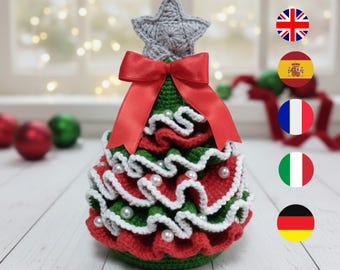 May include: A handmade crochet Christmas tree with a gray star topper and a red ribbon. The tree features layers of red and green crochet with white trim and pearl accents. The text "CHRISTMAS TREE CROCHET PATTERN PDF" is at the top.