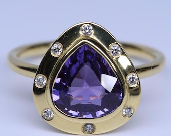The Violet Flame Ring - unheated purple sapphire,diamonds and 18k yellow gold.