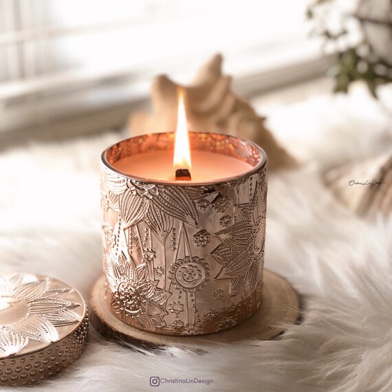 This Woodwick candle that smells and sounds like a crackling fire is on  sale