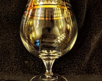 Copas de coñac de cristal de alta calidad, fabricadas en Italia a mediados del siglo XX. Con detalles dorados.