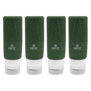 May include: Four green travel bottles with a textured chevron pattern on the top half. The bottom half is clear plastic. Each bottle has the words "KIND KIT" and a suitcase icon printed on it. The bottles are designed for travel.