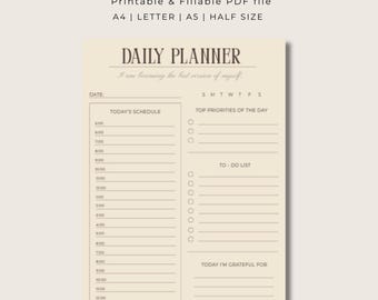 May include: A minimalist daily planner with a cream-colored background. The planner includes sections for the date, schedule, priorities, to-do list, and gratitude. Text on the planner includes "Daily Planner" and "Today's Schedule". The planner is available in A4, Letter, A5, and half sizes.