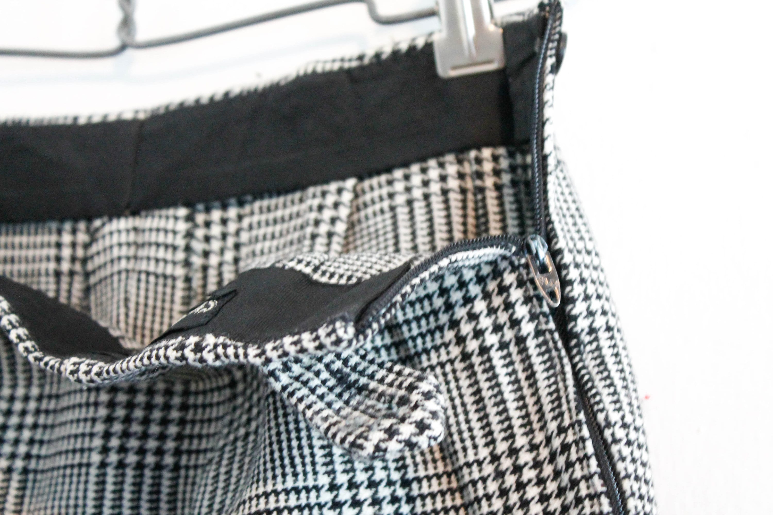 Girl . 1960s houndstooth plaid stirrup pants by Jack Winter . md