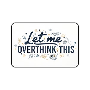 May include: White rectangular mousepad with the text "Let me OVERTHINK THIS" in navy blue and black, with gold and navy blue doodles. The mousepad has a black border.