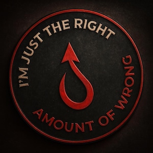 May include: A round, black emblem with the text "I'M JUST THE RIGHT AMOUNT OF WRONG" in a light tan color. A red arrow and hook design is in the center. The emblem has a textured appearance.