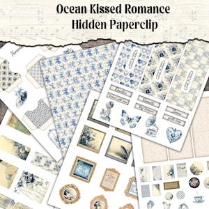 May include: A collection of blue and white paper ephemera with the text "Ocean Kissed Romance Hidden Paperclip." The assortment includes patterned papers, framed images, and labels with phrases like "Devotion" and "Romantic."