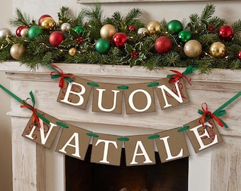 May include: A two-tiered banner made of brown square cards with white letters spelling BUON NATALE, connected by green ribbons and red bows. The banner is displayed in front of a fireplace mantel decorated with green pine branches and ornaments.