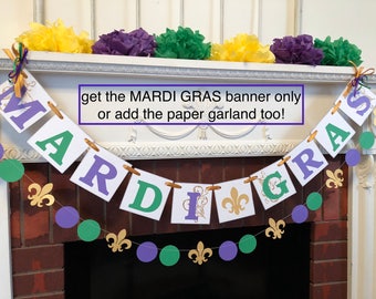 May include: A Mardi Gras banner with purple, green, and gold letters spelling out "Mardi Gras". The banner is hanging from a white fireplace mantel. A paper garland with purple and green circles and gold fleur-de-lis is hanging below the banner. The text "get the MARDI GRAS banner only or add the paper garland too!" is written in a white box on the image.