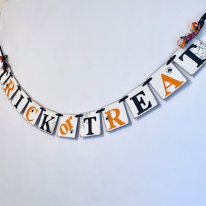 Trick or Treat Halloween Banner: Spooky Spider Web Party Decor