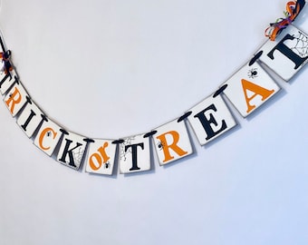 Trick or Treat Halloween Banner: Spooky Spider Web Party Decor