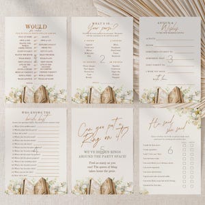 May include: Set of six wedding game cards with a floral design. The cards feature various games, including "Would You Rather," "What's in Your Purse?," and "He Said, She Said." The text is in a handwritten style font.