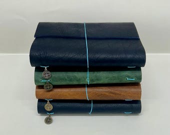 Diarios de viaje de cuero con papel marmoleado