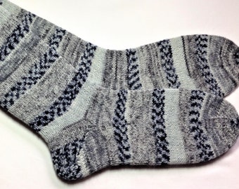 May include: A pair of gray and blue striped socks with a subtle pattern. The socks are made of a soft, comfortable material and are perfect for everyday wear.