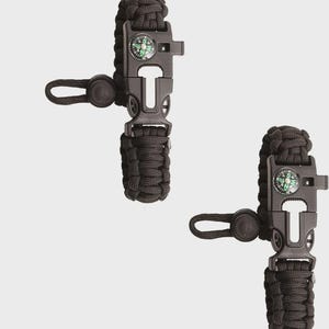 May include: Two black survival bracelets with integrated compasses. Each bracelet features a woven paracord band, a black plastic buckle, and a small compass with green and white markings. The bracelets are designed for outdoor activities and emergency preparedness.