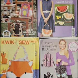 May include: Four sewing pattern envelopes featuring various bag designs. Top left: Kwik Sew 3925 Monkey, Monster & Me lunch bags. Top right: Ellie Mae Designs K216 Sweet Slices fruit bags. Bottom left: Kwik Sew K4212 fox bag. Bottom right: Ellie Mae Designs K241 Pretty & Practical Backpacks.