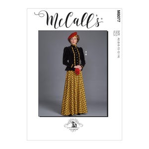 May include: McCall's sewing pattern featuring a woman in a black jacket with gold trim, a yellow and black plaid skirt, and a red beret. The pattern includes sizes A5 (6-8-10-12-14).