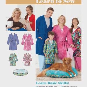 May include: Simplicity 1946 Learn to Sew pattern envelope featuring illustrations and photographs of robes for adults and children, plus a pet bed. The pattern includes instructions for choosing sizes, cutting patterns, stitching seams, applying pockets, attaching sleeves, making belts, and inserting zippers.
