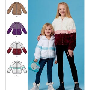 May include: Simplicity pattern S8999 features children's hooded jackets. The jackets are shown in various color combinations, including brown, purple, red, and white. The image also shows two young girls wearing the jackets. The Simplicity logo and the text "SINCE 1927" are visible.