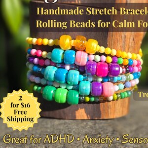 May include: A stack of colorful pony bead fidget bracelets in various colors, including blue, pink, and green. The bracelets are handmade and designed for calm focus. Text on the image reads "Pony Bead Fidget Bracelets" and "Great for ADHD • Anxiety • Sensory Seekers."