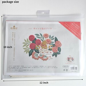 May include: A clear plastic package containing a DMC embroidery kit. The kit features a floral design with red, pink, and orange flowers, green leaves, and the text "Flower Bouquet Collection". The package measures 12 inches wide and 10 inches high.