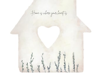 May include: Watercolor-style print featuring a house shape with a heart-shaped cutout. The text "Home is where your heart is" is above the house. Below, it reads "Marius Marie Anton est 2024" with an arrow design. The house has a soft, pastel color palette.