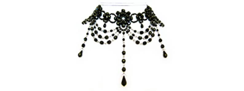 May include: A black beaded choker necklace with a floral design and dangling strands of beads.