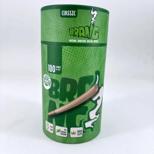 May include: A green cylindrical container with the word "CLASSIC" at the top. The container has the word "BRANG" in a stylized font, along with "NATURAL UNREFINED ROLLING PAPERS". It also features a pre-rolled cone and the text "100 CONES PER PACK".