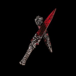 May include: Two crossed daggers featuring pointed blades with a mottled red and black finish. The hilts and pommels are crafted from a textured, dark metallic material with an intricate, organic, and weathered appearance throughout the handles.