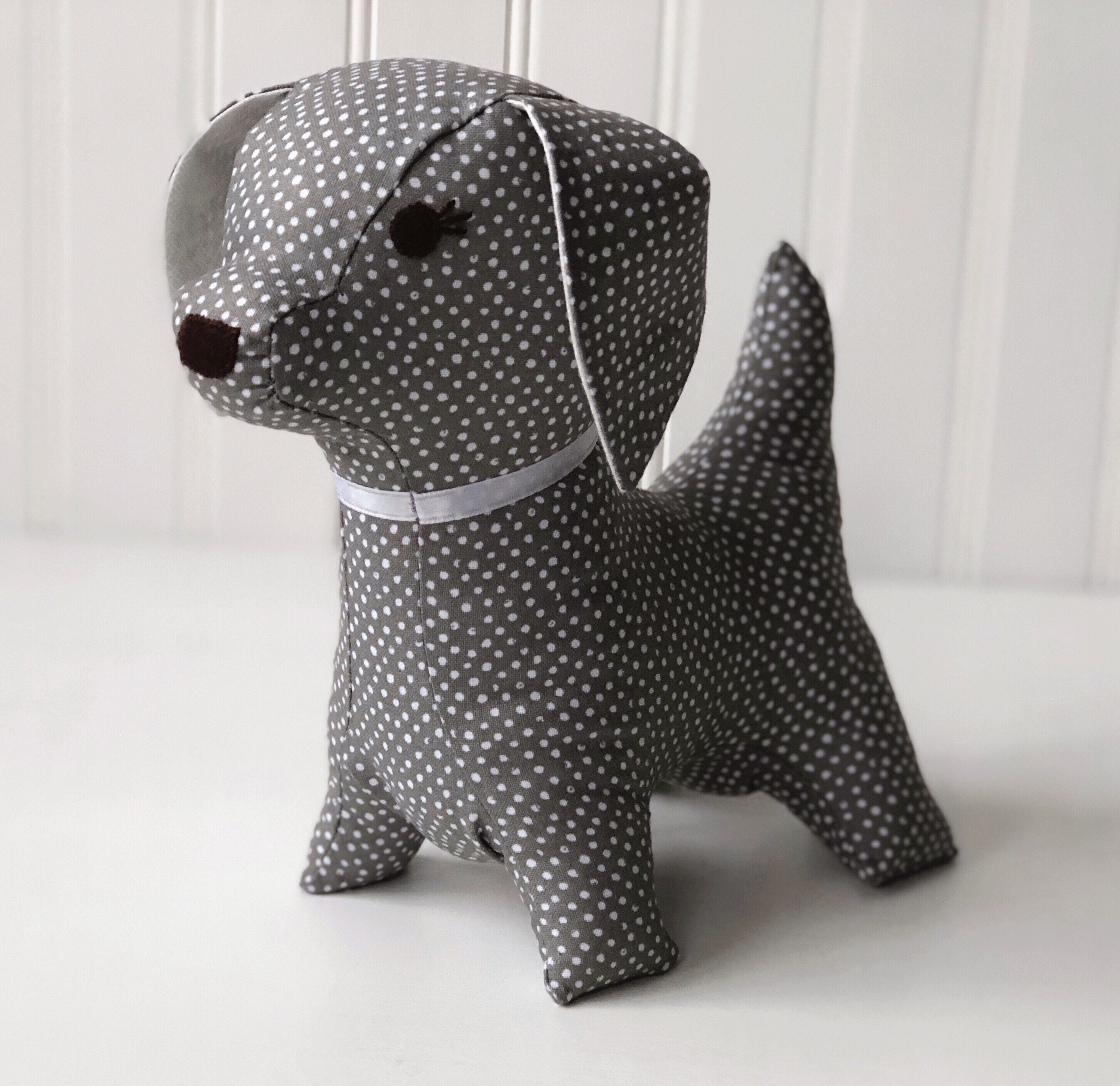 stuffed dog with puppies inside