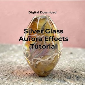 May include: A clear glass art piece with silver, yellow, and purple aurora effects. The text "Digital Download" and "Silver Glass Aurora Effects Tutorial" are displayed on the image. The glass has a unique, organic shape.