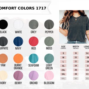 Pode incluir: Uma tabela de cores para camisetas Comfort Colors 1717, com cores como preto, branco e cinza. As medidas dos tamanhos s&atilde;o em polegadas, de S a 4XL. O texto 'COMFORT COLORS 1717' est&aacute; vis&iacute;vel.