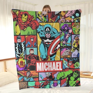 May include: A white ceramic mug with a black handle and the text "But First, Coffee" in a black, handwritten-style font. The mug is on a white surface.