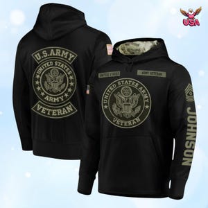 May include: Black hoodie featuring the U.S. Army emblem and the text "U.S. ARMY UNITED STATES ARMY VETERAN." The hoodie includes the name "JOHNSON" on the sleeve and a camouflage pattern inside the hood.