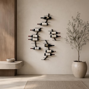 May include: A modern wall-mounted wine rack made of black metal, holding several bottles of wine. The rack has a minimalist design, with horizontal bars to support the bottles. The bottles are arranged in a staggered pattern against a neutral wall.