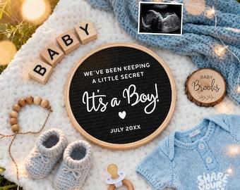 May include: A baby announcement scene with a black felt letter board that reads "It's a Boy!" surrounded by baby items. Includes knitted booties, a pacifier, wooden blocks spelling "BABY", and a baby onesie.
